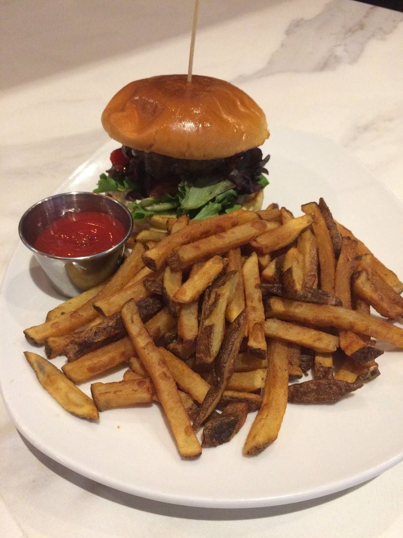 Hamburgers seem to be about the best option at Mulavi in Midtown. This is the Mulavi Burger (beef patty with roasted tomato, eggplant, red bell pepper, spring mix, feta and roasted red onion aioli) with fries. CONTRIBUTED BY WENDELL BROCK
