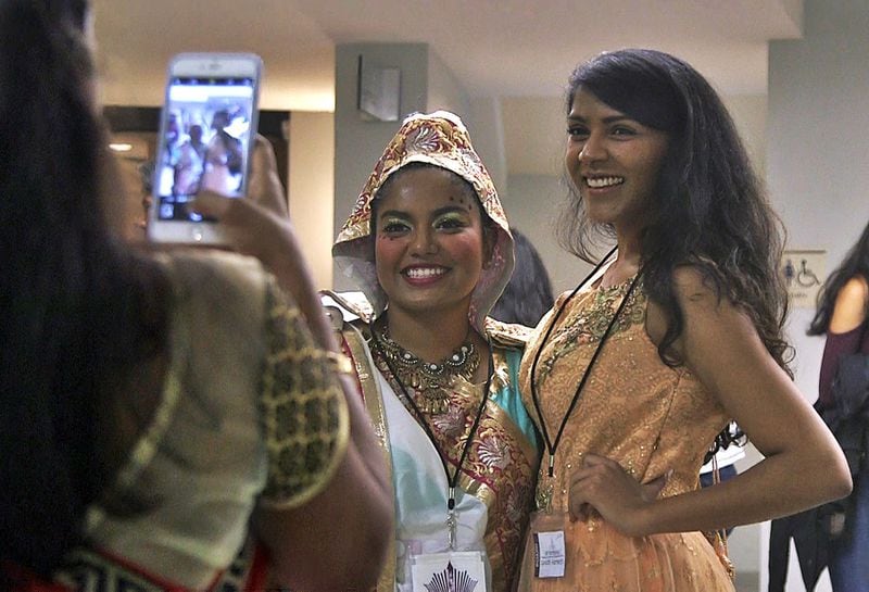 Sunidhi Ramesh (right) was born in India but moved to America when she was just when she was just a year and a half old. Now a senior at Emory University, Ramesh seeks out connections to her roots through extracurriculars like leading the board planning ATL Tamasha, Georgia Tech’s Premier Fall Dance Competition, featuring Bollywood Fusion, Raas-Garba, and Bhangra teams from across the region. ERICA A. HERNANDEZ / EHERNANDEZ@AJC.COM