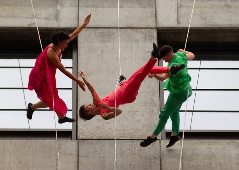 Bandaloop dancers perform on the side of a building facing the Atlanta Beltline on Sunday, October 3, 2021. (Photo: Steve Schaefer for The Atlanta Journal-Constitution)