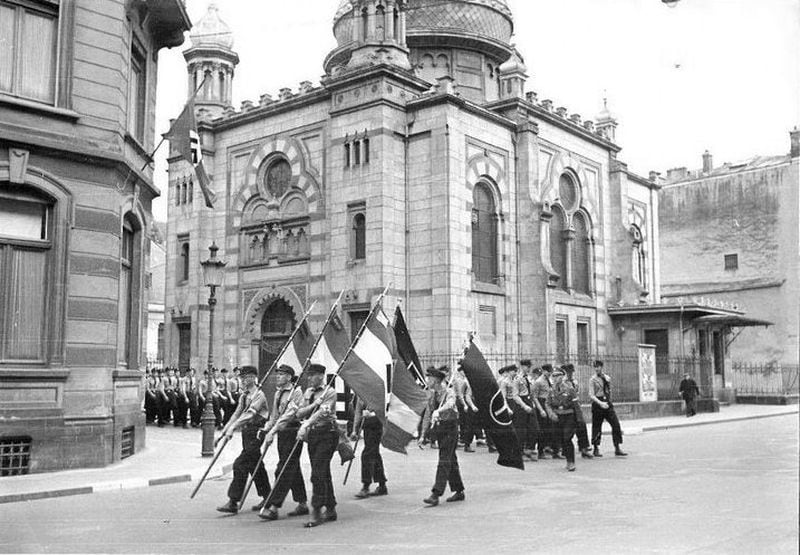 A 1941 Nazi parade in front of the Luxembourg City synagogue. The synagogue was destroyed between August and October 1941. Public domain