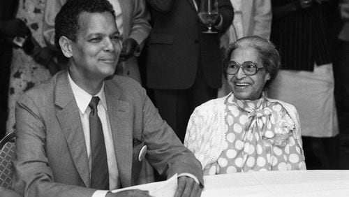 July 1986 -- Bond joins civil rights icon Rosa Parks at a campaign event in Atlanta.