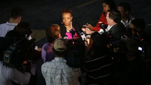 Vickie G. Johnson, who described herself as a 50-year member of Mount Vernon Baptist Church, voted against the deal to sell the church property. She emerged from the church on Thursday night, Sept. 19, 2013, to tell the media the vote count.