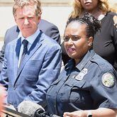Mayor Tim Kelly looks on as Police Chief Celeste Murphy speaks to members of the media during a news conference on the steps of Chattanooga City Hall in 2022. (Photo Courtesy of Matt Hamilton)