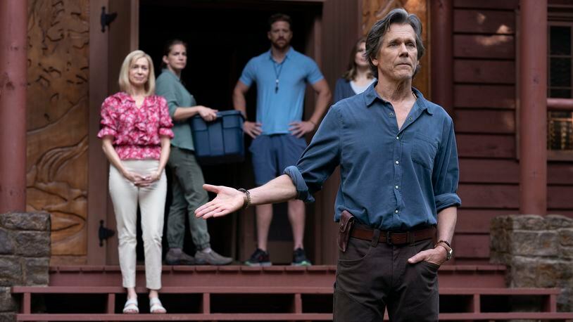 Owen Whistler (Kevin Bacon, with Carrie Preston behind him on left) welcomes new campers to a LGBTQIA+ conversion camp he runs in the Georgia-filmed feature "They/Them," which begins streaming Friday on Peacock. (Photo by Josh Stringer/Blumhouse)