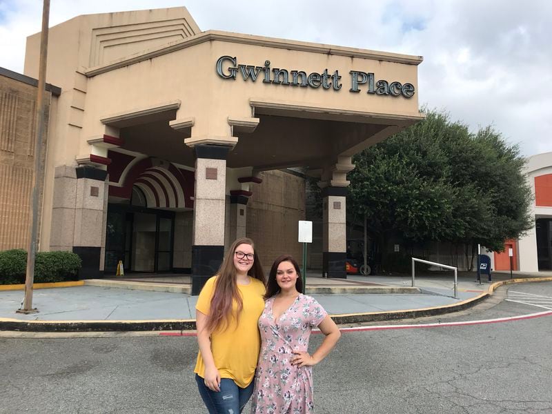 Kianna Dudley (right) and Rachel Craig (left) considered dumpster diving for souvenirs but given the height of the dumpsters and the security, decided against it.