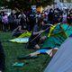 Pro-Palestinian protesters set up tents Thursday evening at Emory University before eventually retreating. (Arvin Temkar/AJC)