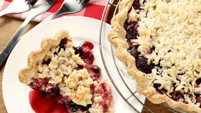 A bumbleberry pie gets its name from the mix of berries that comprise the filling. Though it can include other fruit, such as rhubarb, this one sticks with berries: raspberries, blueberries, and blackberries. (Michael Tercha/Chicago Tribune/TNS)