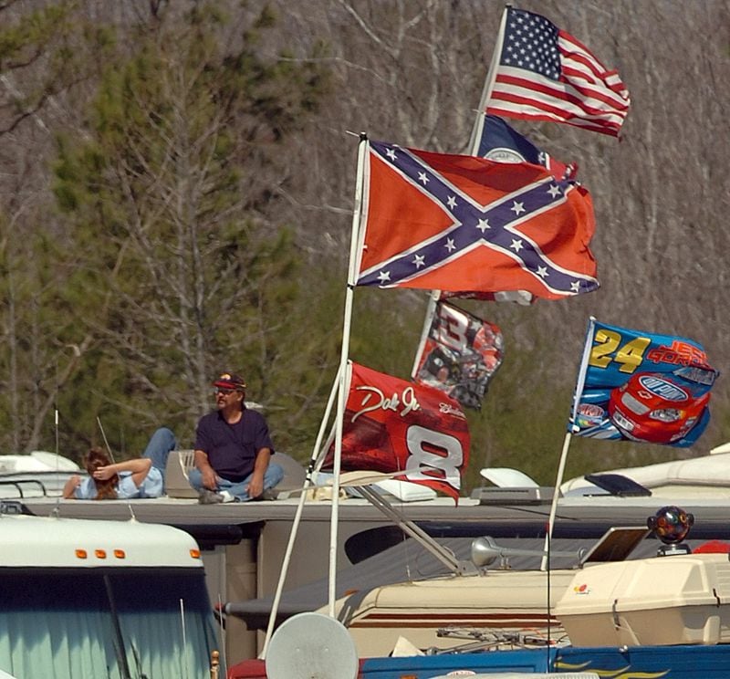 A Confederate flag flies at Atlanta Motor Speedway in 2006.   David Tulis/AJC STAFF