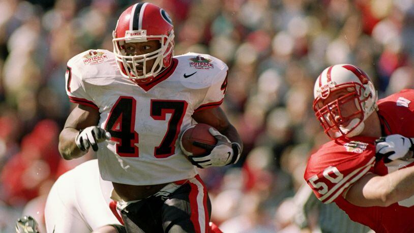 Georgia running back Robert Edwards moves the ball during the 1998 Outback Bowl against the Wisconsin Badgers at Houlihan's Stadium in Tampa, Fla. Georgia won, 33-6.