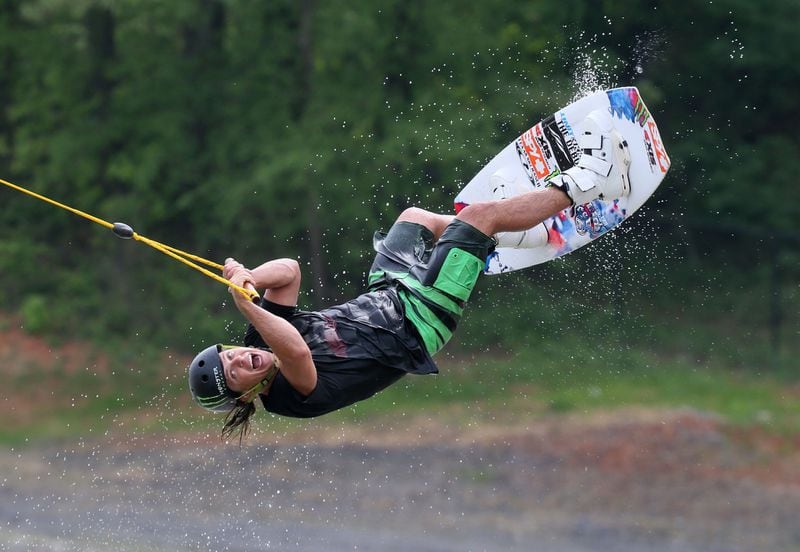 Tom Fooshee, team member at Terminus Wake Park in LakePoint, tries out one of the jumps. (BOB ANDRES / BANDRES@AJC.COM)