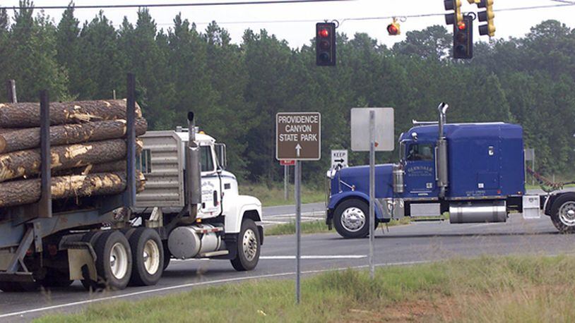 A divided Georgia House of Representatives approved a bill Monday that would allow heavier trucks on state highways. (AJC FILE PHOTO)
