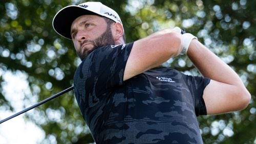 Jon Rahm watches his tee shot on the fourth hole during the third round of the PGA Tour Championship on Saturday, Sept. 4, 2021, at East Lake Golf Club in Atlanta. Ben Gray for the Atlanta Journal-Constitution