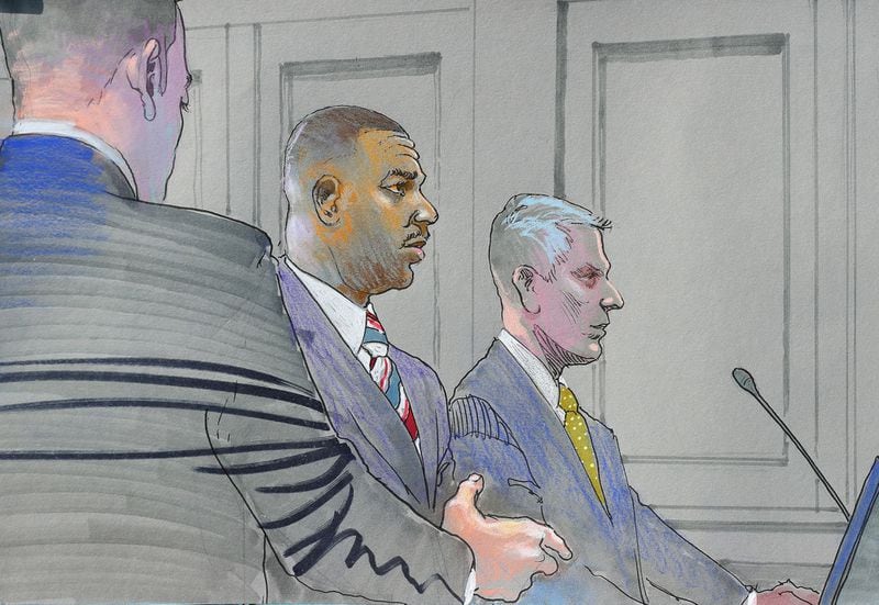 September 26, 2017 Atlanta: This is an artist’s rendition of Adam L. Smith (center) in court with his attorney where he plead guilty to accepting more than 30,000 in bribes at the Richard B. Russell Federal Building on Tuesday, September 26, 2017, in Atlanta. Special artwork by Richard Miller