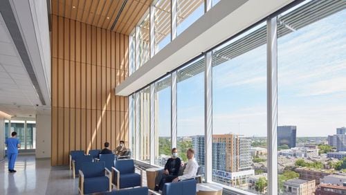 In the Winship at Emory Midtown care community lounges, which join inpatient and outpatient floors, patients and their families can socialize with other patients and families facing the same type of cancer. Photo by Dave Burk © SOM