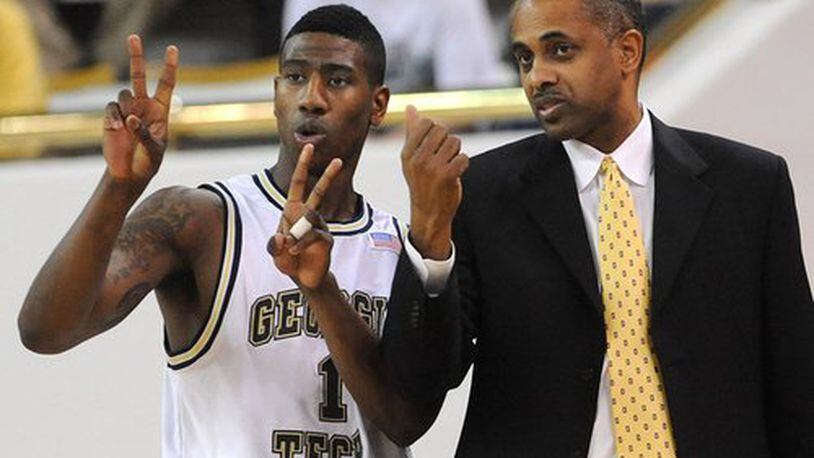 Former Georgia Tech coach Paul Hewitt with Yellow Jackets guard Iman Shumpert during a game against Kentucky State in the 2009-10 season at Alexander Memorial Coliseum.