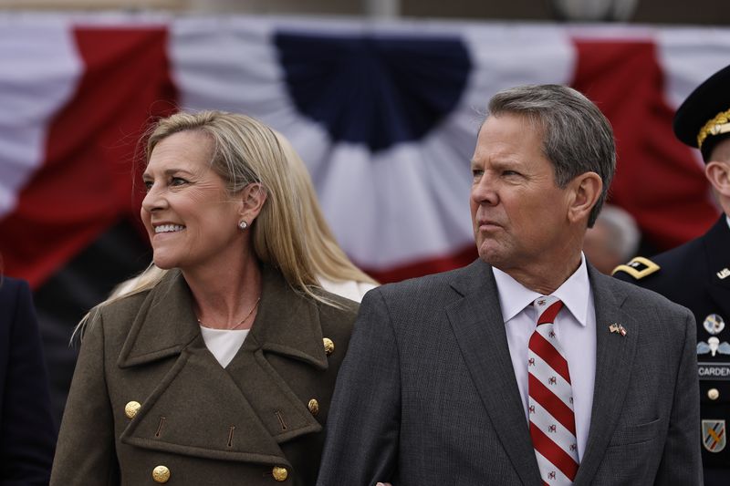 Gov. Brian Kemp and his wife Marty smile at supporters outside Georgia State University Convocation Center  following his inauguration on Thursday, January 12, 2023.  (Natrice Miller/natrice.miller@ajc.com)    