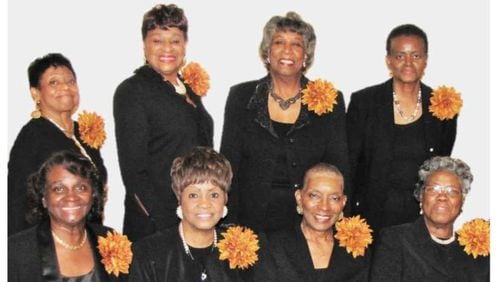 These eight women are members of the G.I.R.L.S. Bridge Club, which recently donated $100,000 to Spelman College to start a scholarship endowment for students, particularly those considering careers as teachers. (Courtesy of the G.I.R.L.S. Bridge Club)