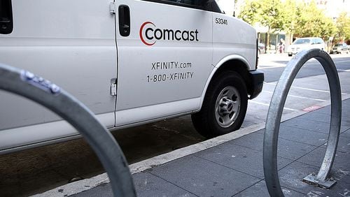 SAN FRANCISCO, CA - JULY 13: A Comcast service vehicle is seen parked on July 13, 2015 in San Francisco, California. Comcast announced plans to launch a streaming video service later this summer for Xfinity internet subscibers. The service called Stream will cost $15 a month. (Photo by Justin Sullivan/Getty Images)