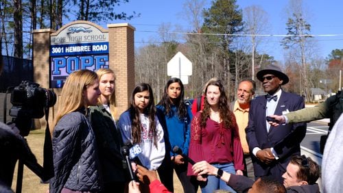 Pope High School students who are organizing a walkout Wednesday as part of a nationwide protest against gun violence held a news conference outside their school Tuesday to discuss the response from Cobb County School District. The students said school officials have provided changing and contradictory information about what discipline students will face if they walkout.