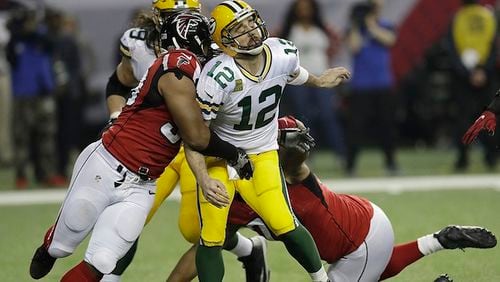 In the last game Green Bay Packers quarterback Aaron Rodgers played, Atlanta Falcons defensive end Dwight Freeney (93) hit Rodgers after he throws during the second half of the NFL football NFC championship game Sunday, Jan. 22, 2017, in Atlanta. (AP Photo/David J. Phillip) Rodgers was named ESPN The Magazine’s cover athlete for the 2017 NFL preview issue on Wednesday.