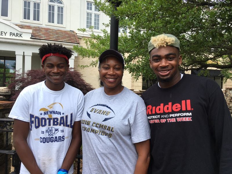 Georgia Tech freshman wide receiver Pejé Harris (right) with his younger brother Joshua, a rising sophomore at Newnan High, and his mother Vera, principal at Evans Middle School in Coweta County.