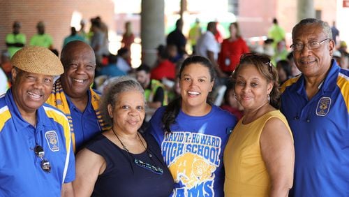 Atlanta Public Schools Superintendent Meria Carstarphen, center, poses for a photograph with members of the David T. Howard High School Alumni Association during a "topping out" ceremony on Friday, Aug. 23, 2019. Bill Goodman/Atlanta Public Schools