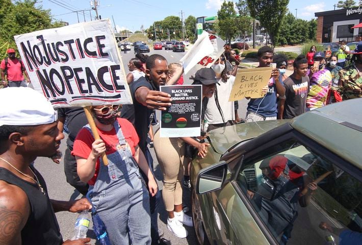 PHOTOS: Protesters hold demonstration in Atlanta over police shooting of Rayshard Brooks