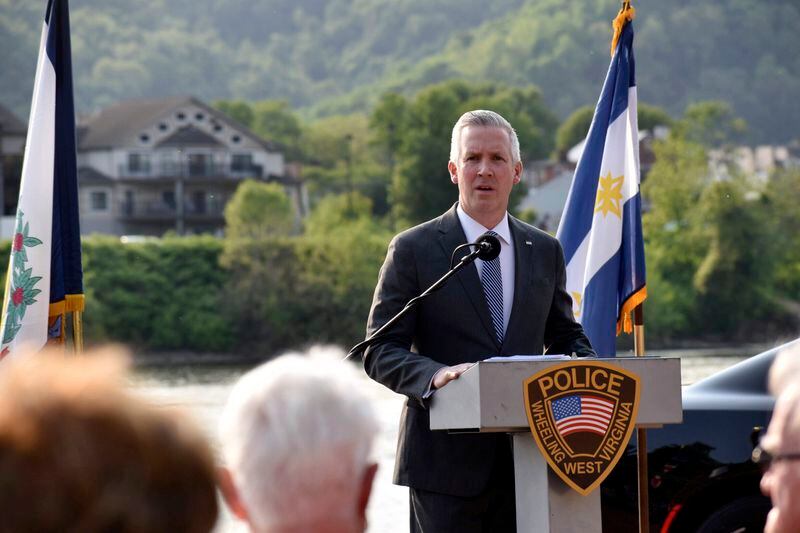 Wheeling Mayor Glenn Elliott speaks during the 10th Annual Wheeling Police Department Law Enforcement Memorial ceremony at Wheeling Heritage Port in Wheeling, W.Va., on May 18, 2023. Outgoing U.S. Sen. Joe Manchin endorsed the on Monday, April, 22, 2024, in the Democratic primary race for his seat representing deep-red West Virginia, where Manchin is currently the only Democrat holding statewide office. (Eric Ayres/The Intelligencer via AP)