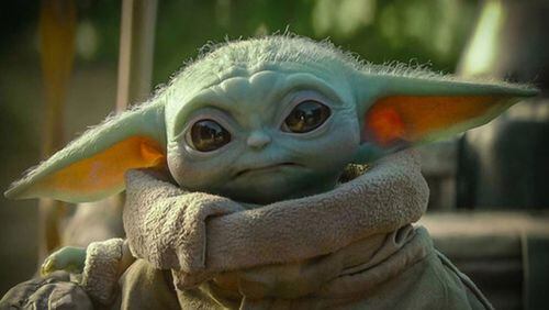 On Thursday, a larger-than-life helium-filled likeness of Grogu, the beloved “Mandalorian” character also known as Baby Yoda and the Child, is making its aerial debut above the streets of New York. (AJC file photo)