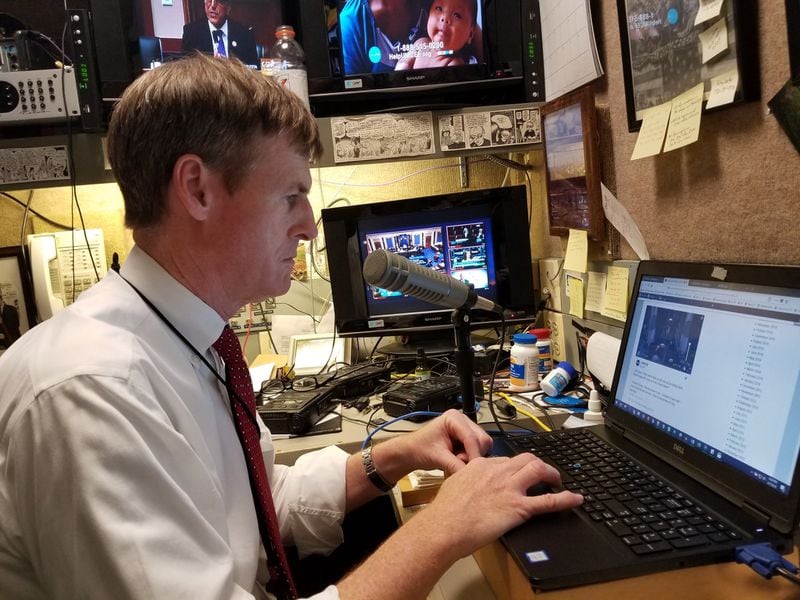 Radio reporter Jamie Dupree, who has been covering Washington for 30 years, works at his tiny booth on the Senate side of Capitol Hill. PHOTO: COURTESY JAMIE DUPREE