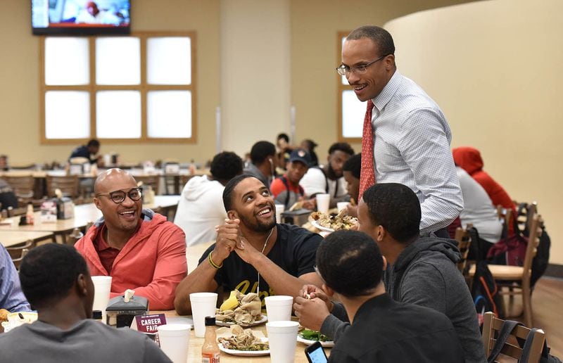 Harold Martin, former interim president of Morehouse College, greets students and faculty members   in the college cafeteria on Wednesday, August 30, 2017. (HYOSUB SHIN / HSHIN@AJC.COM)