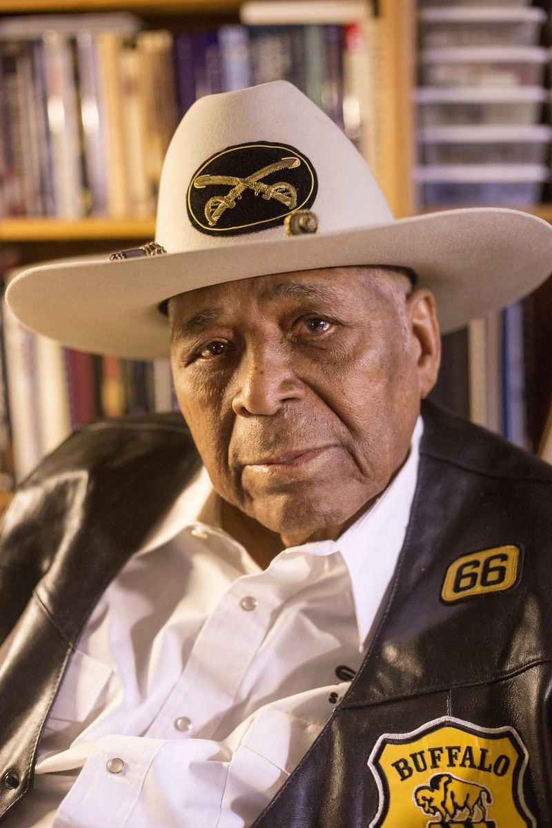 Buffalo soldier Harold S. Cole, 93, poses for a portrait at his Cobb County home. Trooper Cole is one of a few living Buffalo soldiers in the United States. Cole, who served in the United States Army from 1942-1946, signed up during World War II when he was 17 years old. In addition, Trooper Cole has also served in the United States Air Force. ALYSSA POINTER/ALYSSA.POINTER@AJC.COM