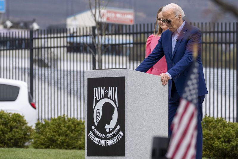 President Joe Biden, and Scranton Mayor Paige Cognetti, pause at a Scranton war memorial, Wednesday, April 17, 2024, in Scranton, Pa. (AP Photo/Alex Brandon)
