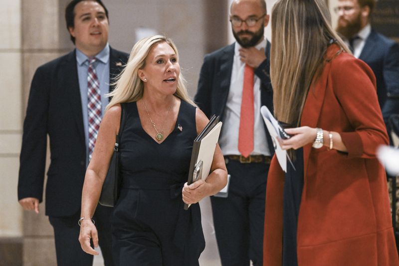 The House Freedom Caucus on Friday took a secretive vote that could result in the ouster of U.S. Rep. Marjorie Taylor Greene (center) from the ultra-conservative group. (Kenny Holston/The New York Times)