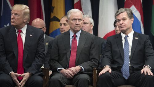 From left, President Donald Trump, Attorney General Jeff Sessions and FBI Director Christopher Wray. (Tom Brenner/The New York Times)