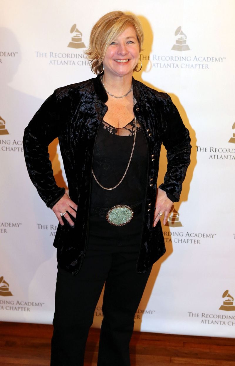 Singer-songwriter Diane Durrett walks the red carpet at an event to celebrate Grammy Awards nominees from Georgia Wednesday, Jan. 15, 2014 at Callanwolde Fine Arts Center in Atlanta.
