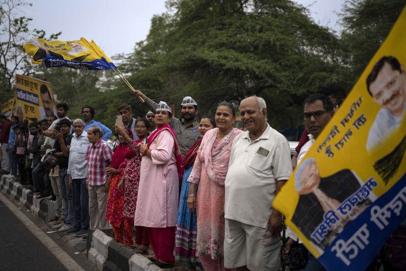 Aam Aadmi Party supporters wait for the release of party leader Arvind Kejriwal outside Tihar Jail in New Delhi, India, Friday, May 10, 2024. The Supreme Court ordered Arvind Kejriwal's temporary release enabling him to campaign in the country's national election until the voting ends on June 1. (AP Photo /Altaf Qadri)