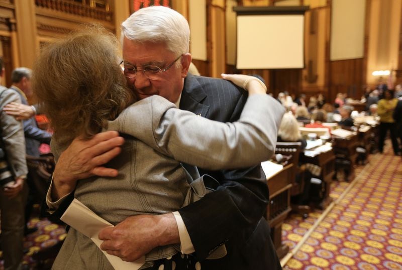 Then-Rep. Joe Wilkinson, R-Atlanta, hugs House staff member Debbie Lynn after giving his farewell speech on March 24, 2016. 
