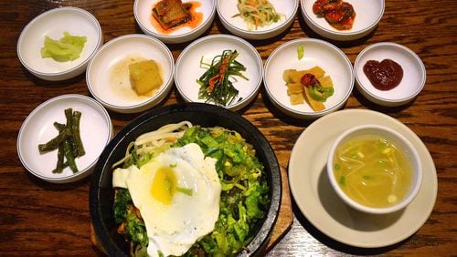 Dolsot bibimbap is a specialty at Woo Nam Jeong Stone Bowl House in Doraville. (Chris Hunt / special)