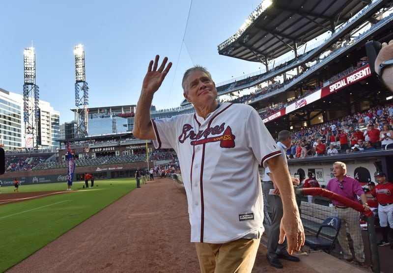 Braves legend Dale Murphy waves as he was introduced during Alumni Weekend ceremonies last year at SunTrust Park (now Truist Park).