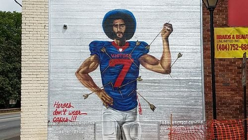 At the Peeples Street intersection with Abernathy, Fabian Williams depicts Colin Kaepernick as the martyred Saint Sebastian.
