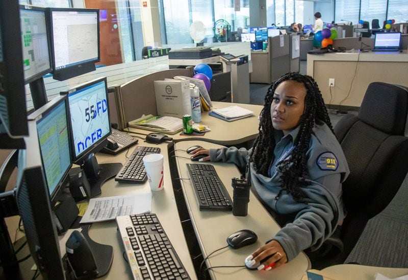 Operator Kelah Handley answers calls at Sandy Springs’ 911 dispatch center Wednesday, April 17, 2019. STEVE SCHAEFER / SPECIAL TO THE AJC