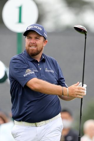 April 9, 2021, Augusta: Shane Lowry hits his tee shots on the first hole during the second round of the Masters at Augusta National Golf Club on Friday, April 9, 2021, in Augusta. Curtis Compton/ccompton@ajc.com
