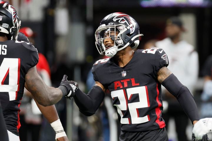 Falcons defensive back Cornell Armstrong shakes teammates' hands during warmups before the game against the Panthers on Sunday in Atlanta. 
 (Miguel Martinez / miguel.martinezjimenez@ajc.com)