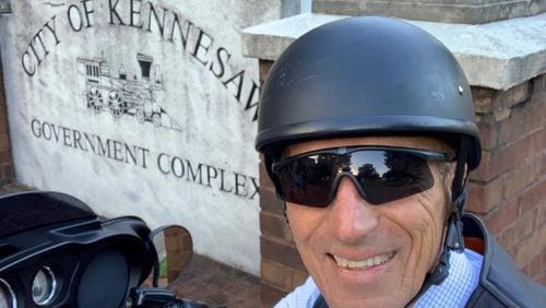 Kennesaw Mayor Derek Easterling poses in front of City Hall for his selfie. #CityHallSelfie Day will be held on Aug. 14 by Kennesaw. (Courtesy of Kennesaw)