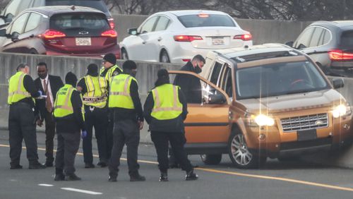 The eastbound lanes of I-20 were closed for more than three hours on Feb. 25, 2021, after a man was found shot inside his vehicle in downtown Atlanta. (JOHN SPINK / John.Spink@ajc.com)