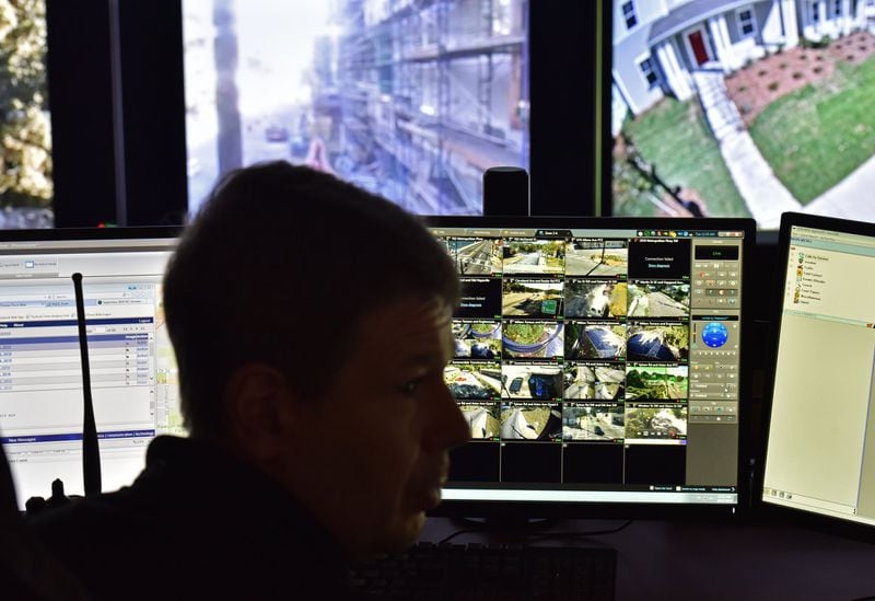 October 22, 2019 Atlanta - APD officer Charles Schiffbauer monitors surveillance cameras at Loudermilk Video Integration Center in Atlanta on Tuesday, October 22, 2019. If you’re in Atlanta, you’re probably on camera. Data from tech research firm Comparitech finds roughly 15 security cameras for every 1,000 residents, making us the only U.S. city to crack the top 10 in a study of the world’s most surveilled places. (Hyosub Shin / Hyosub.Shin@ajc.com)