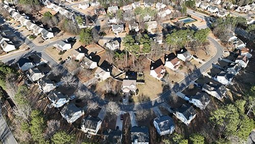 Aerial view of Winslow at Eagles Landing neighborhood, where large number of homes are owned by investors, Thursday, Jan. 26, 2023, in McDonough. Two companies — Invitation Homes and Progress Residential — each own more than 10,000 homes in the metro Atlanta area as of, or near the end of, the 2nd quarter 2022. In fact, there are 11 companies with ties to private equity that own more than 1,000 homes, according to an AJC analysis. (Hyosub Shin / Hyosub.Shin@ajc.com)