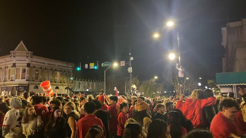 Georgia fans pack the streets of downtown Athens after the Bulldogs win the national championship. (Holland Mowry/Special to The AJC)