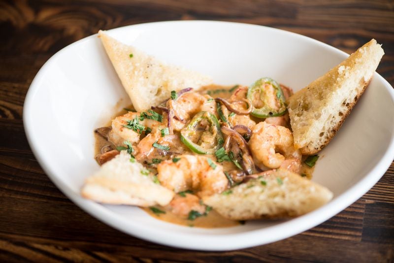 Rise & Revelry Royal Reds Shrimp Small Plate with sauteed Alabama shrimp, garlic, onions, and tomatoes.